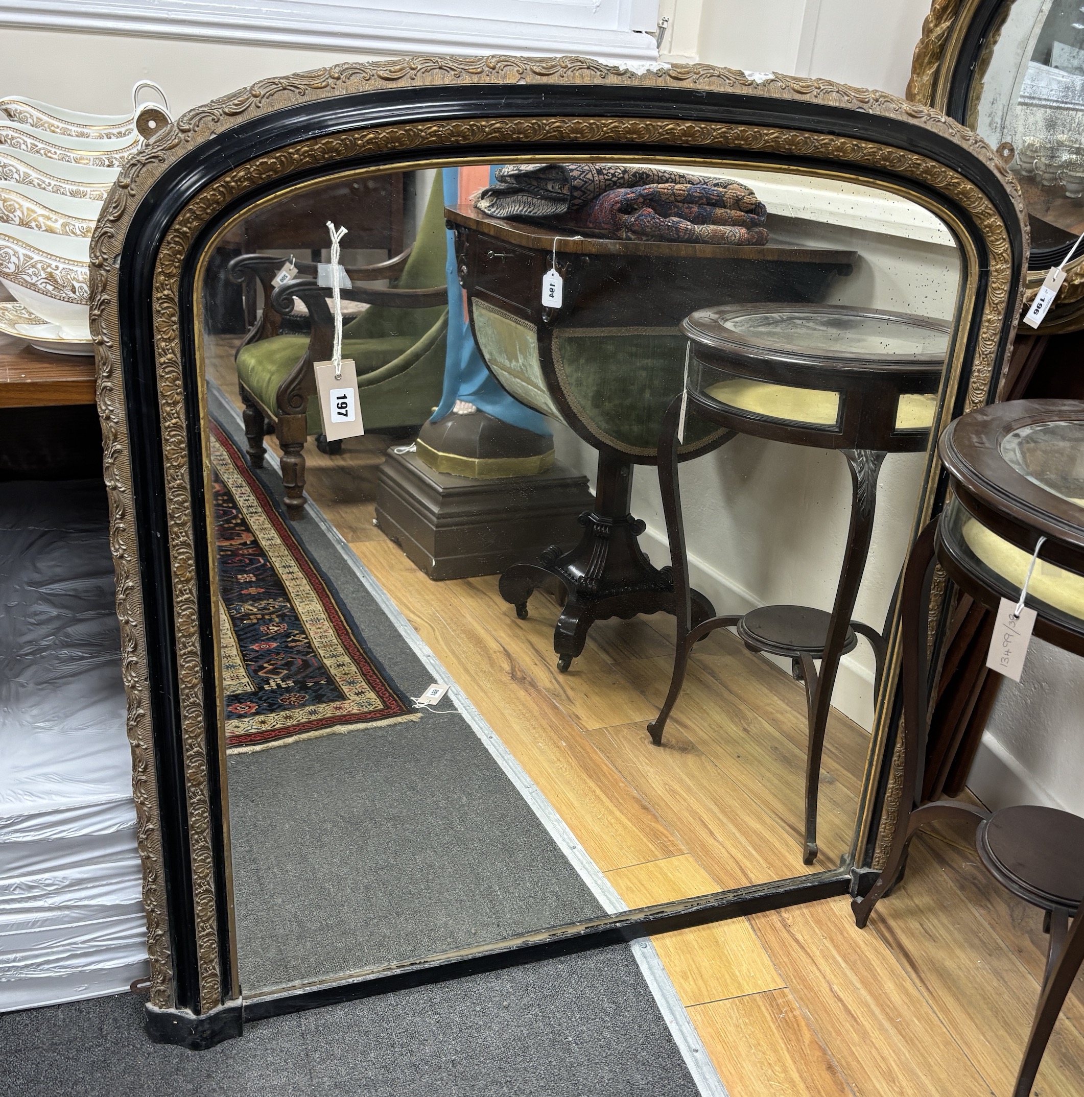 A Victorian ebonised and gilt composition overmantel mirror, width 94cm, height 102cm